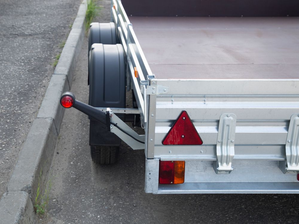 Back of an open-bed metal trailer